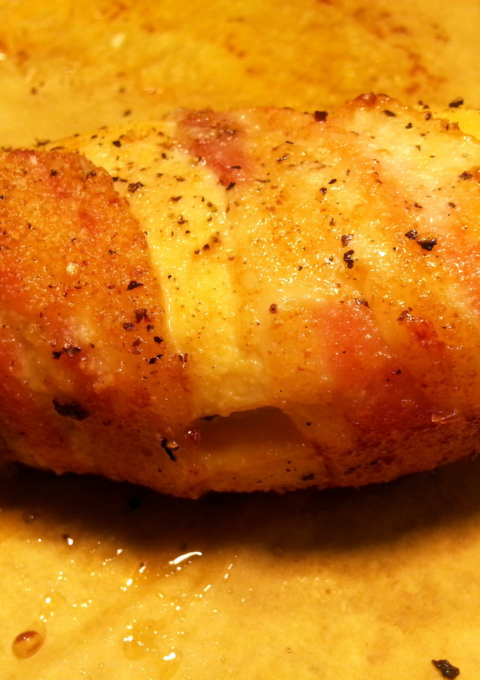 A picture of Bacon-Wrapped/ Cheese-Stuffed Chicken Breast.