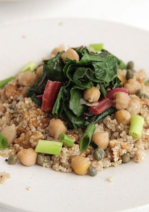 A picture of Caper-Walnut Quinoa with Sautéed Swiss Chard, Chickpeas and Scallions.