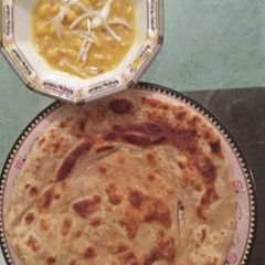 A picture of Paratha with chana.