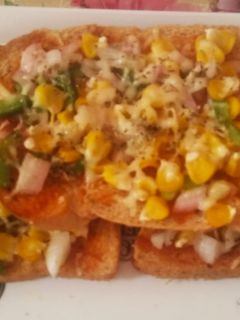 চিজ কর্ন টোস্ট (Cheese corn toast recipe in Bengali) রেসিপির প্রধান ছবি