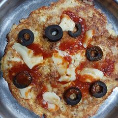 A picture of Egg Onion omlette Chapati pizza.