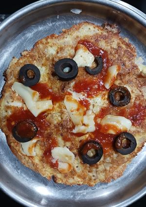 A picture of Egg Onion omlette Chapati pizza.