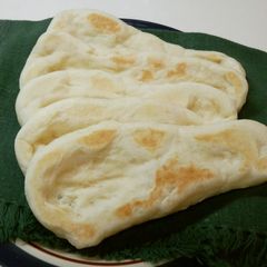 Puffy and Delicious Naan Bread A picture of Puffy and Delicious Naan Bread.