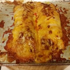 A picture of Chicken enchiladas.