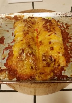 A picture of Chicken enchiladas.