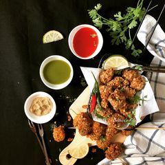 A picture of Chicken Popcorn with Panch Phoron Flavour.
