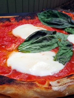A picture of Margherita pizza topping.
