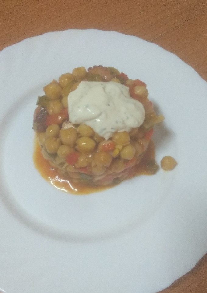 Una foto de Ropa vieja de pulpo con alioli express