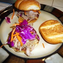 A picture of Crock pot pulled pork BBQ with red cabbage slaw.