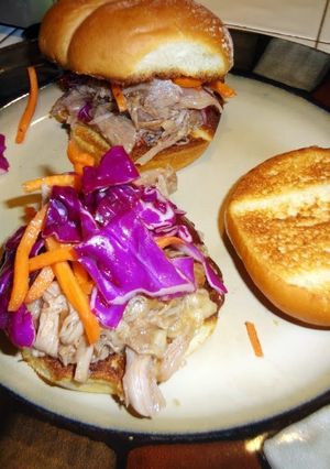 A picture of Crock pot pulled pork BBQ with red cabbage slaw.