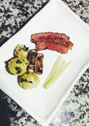 A picture of Southern Steak and red potatoes.
