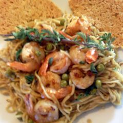 A picture of angel hair with shrimp.
