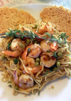 A picture of angel hair with shrimp.