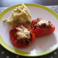 A picture of Stuffed Bell peppers with mashed potatoes.