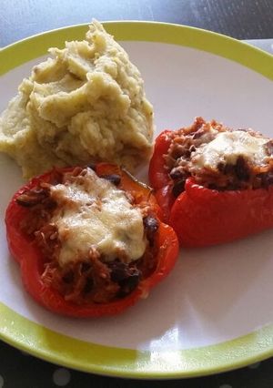 A picture of Stuffed Bell peppers with mashed potatoes.