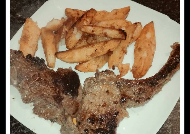 Chuletas de cerdo con patatas al pimentón