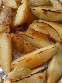 A picture of Vickys Sweet Chilli Sauced Potato Wedges, GF DF EF SF NF.
