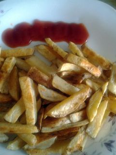 A picture of baked French fries.