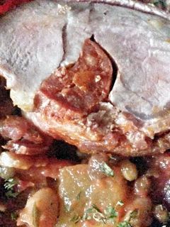 A picture of Sig's Bean and Lentil Stew with griddled and stuffed Tenderloin.