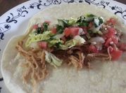 A picture of pork carnitas in slow cooker