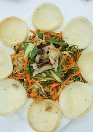 Hình của món Gỏi xoài ốc giác giòn ngon lạ miệng.