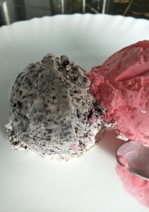 A picture of Chocolate chip and stawberry icecream.