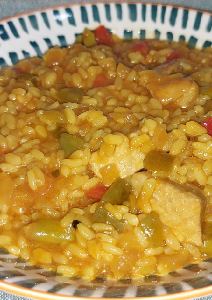 Una foto de Arroz con presa y espárragos