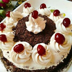 A picture of Egg less Black Forest Cake.