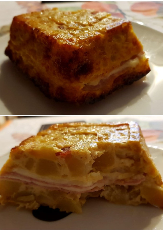 Una foto de Tortilla de patatas rellena de jamón y queso al horno