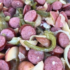 A picture of Grilled Smoked Sausage with Potatoes 🥔.