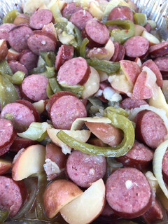 A picture of Grilled Smoked Sausage with Potatoes 🥔.