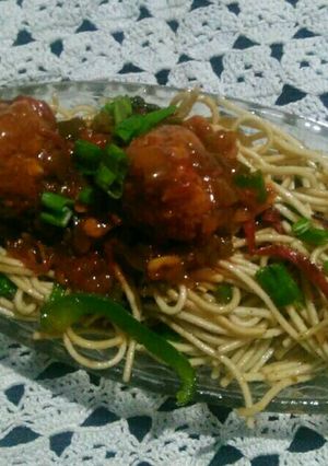 A picture of Manchurian with veg noodles.