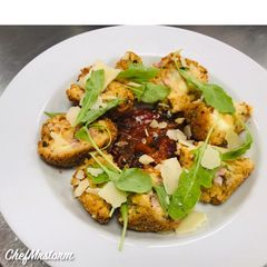 A picture of Spicy Mozzarella and Bacon Arancini with Herby Tomato and Onion Relish.