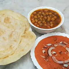 Halwa,Purri,Channa # Special Nashta Recipe A picture of Halwa,Purri,Channa # Special Nashta Recipe.