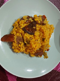 Una foto de Arroz meloso de pato, pebrasos y ajos tiernos(De.O. Xàtiva)