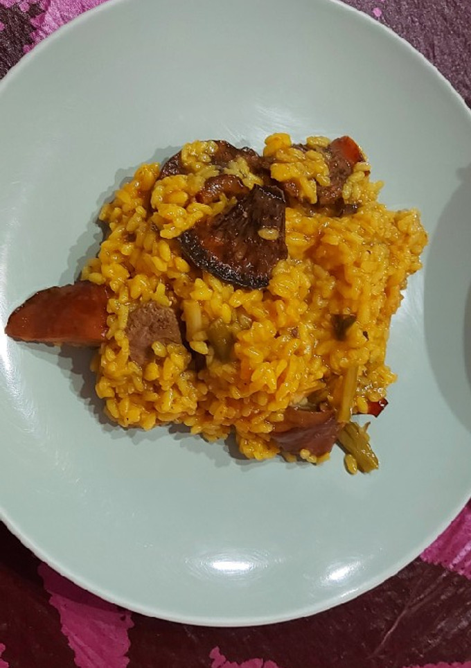 Una foto de Arroz meloso de pato, pebrasos y ajos tiernos(De.O. Xàtiva)