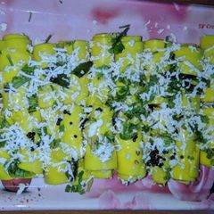 A picture of Paneer cheese khandvi.