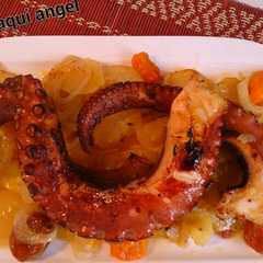 Una foto de Patatas con pulpo al horno!!!