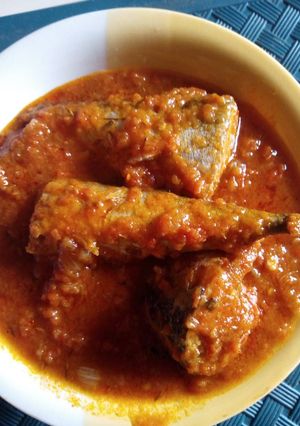 A picture of Tomato stew with fresh titus fish.