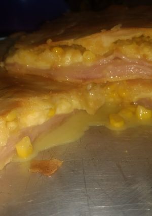 Una foto de Tarta de jamón, queso y choclo