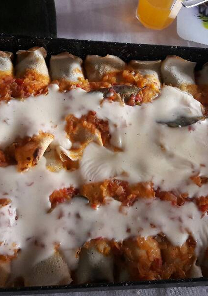 Una foto de Canelones de acelga y carne