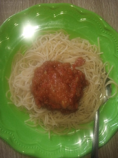 A picture of Spaghetti and stew with turkey.