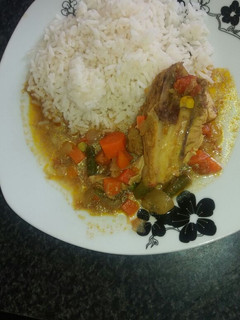 A picture of Chicken curry with vegetables.