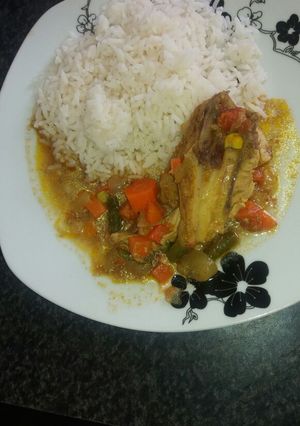 A picture of Chicken curry with vegetables.