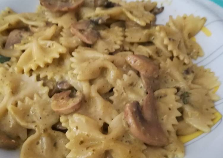 Farfalle pesto e funghi