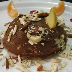 A picture of Orange Apple Singhda Halwa.