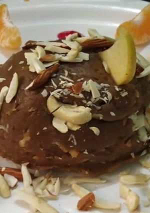 A picture of Orange Apple Singhda Halwa.