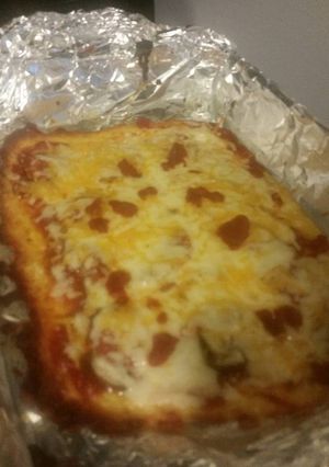 A picture of Low-Carb Cheese Crust Pizza (Yes, Crust made of Cheese).