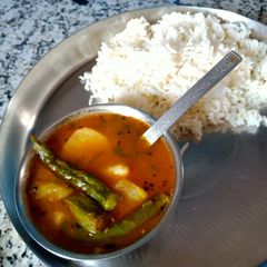 A picture of Sindhi kadhi with rice.