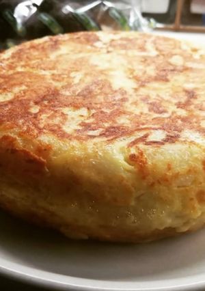 Una foto de Tortilla de patatas con cebolla